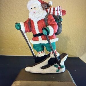 Stocking Holder Vintage Santa Cast Iron Christmas Old World Snow Skiing Santa